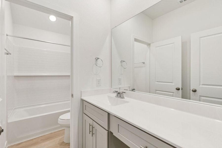 Furnished interior view inside a new home in Ellerden, Tomball (Image 26).