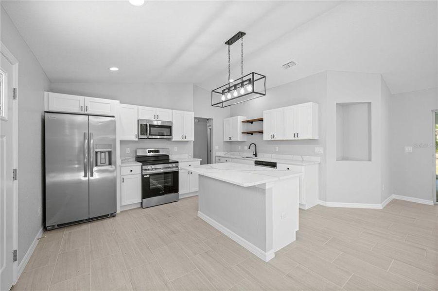 Furnished interior view inside a new home in , Dunnellon (Image 9).