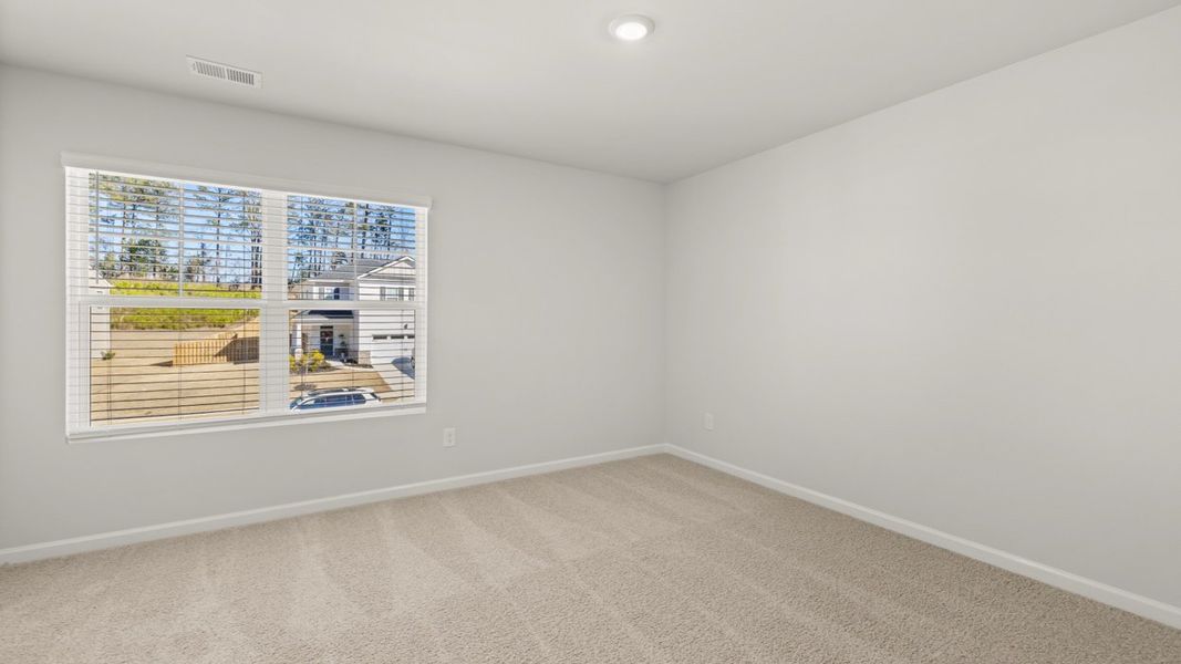 Representative unfurnished interior of a home built from the Halton by D.R. Horton in Southwind Village, Evans (Image 28).