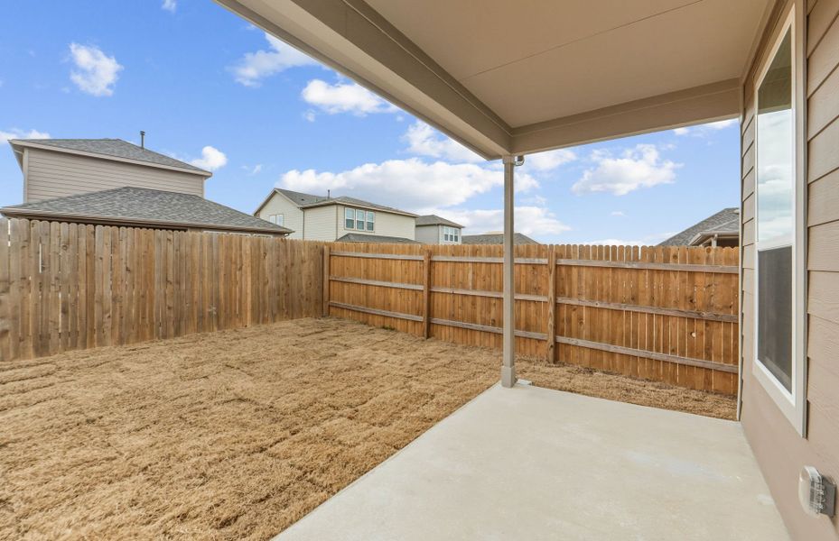 Exterior details and patio area of a home in Crosswinds, Kyle (Image 21).