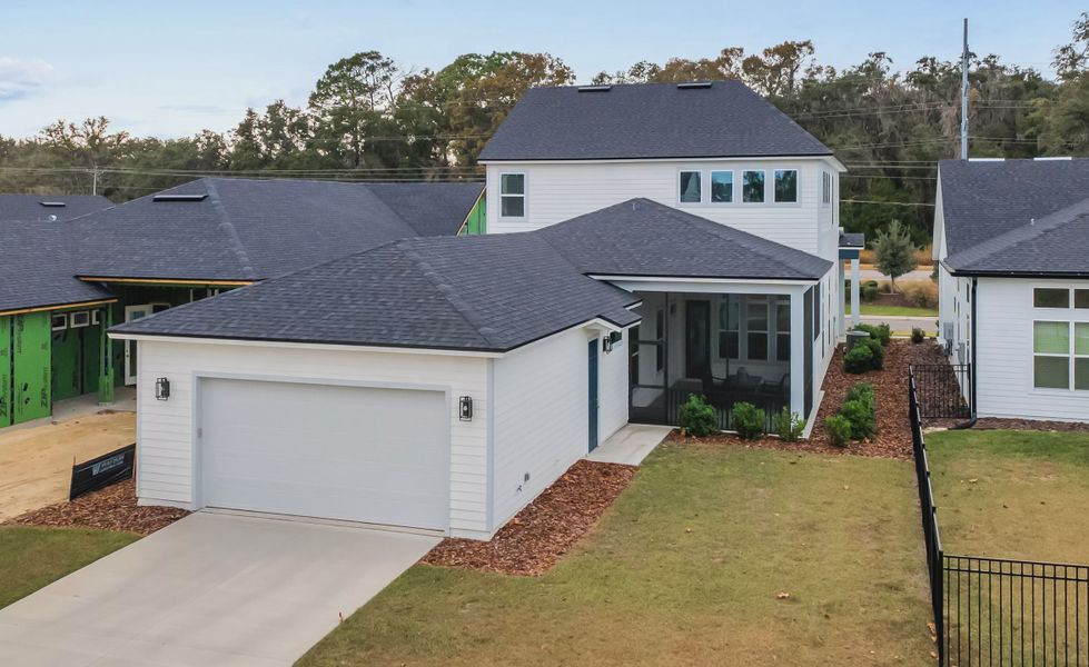 Front exterior of a new home in Oakmont, Gainesville, FL, highlighting curb appeal (Image 2).