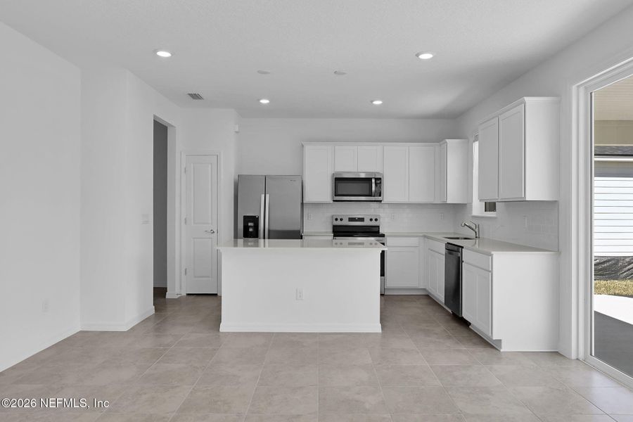 Furnished interior view inside a new home in Hyland Trail, Green Cove Springs (Image 5).