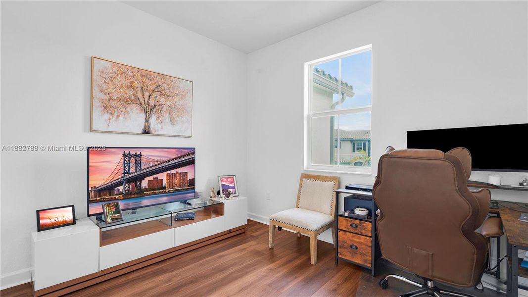 Upgraded vinyl wood flooring flows seamlessly throughout the entire upstairs, including the staircase.