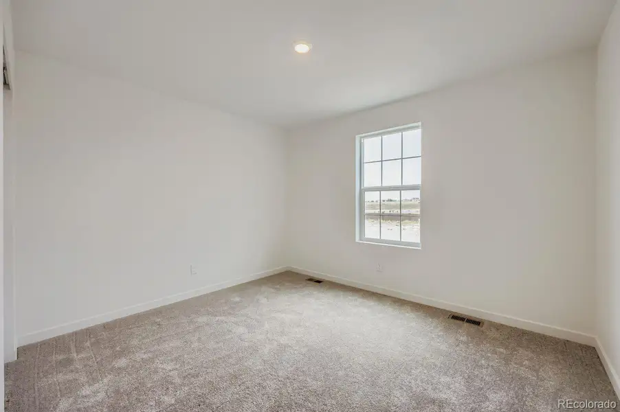 Spacious, unfurnished interior of a new home in Copper Chase: The Celestial Collection, Colorado Springs (Image 9).