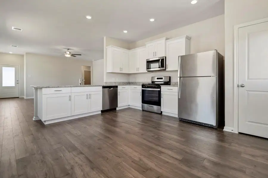 Furnished interior view inside a new home in Sweetwater Ridge, Conroe (Image 5).