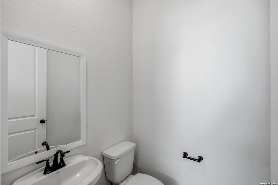 Furnished interior view inside a new home in Rose Hill, San Antonio (Image 11).