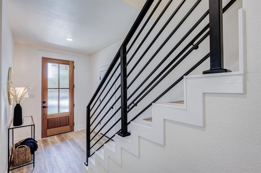 Staircase with wood-type flooring