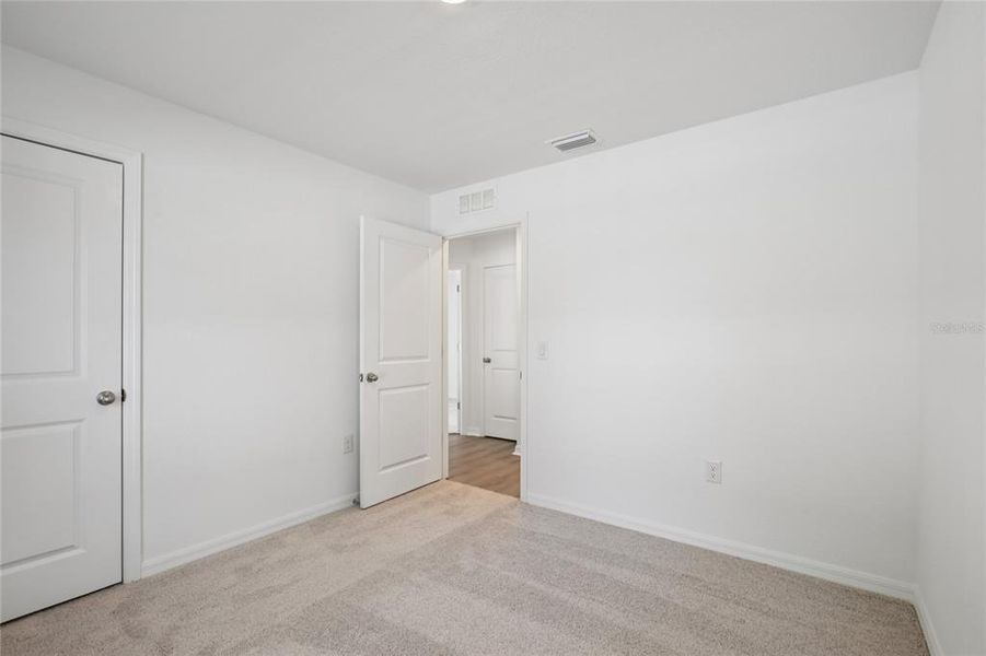 Spacious, unfurnished interior of a new home in , Port Charlotte (Image 16).