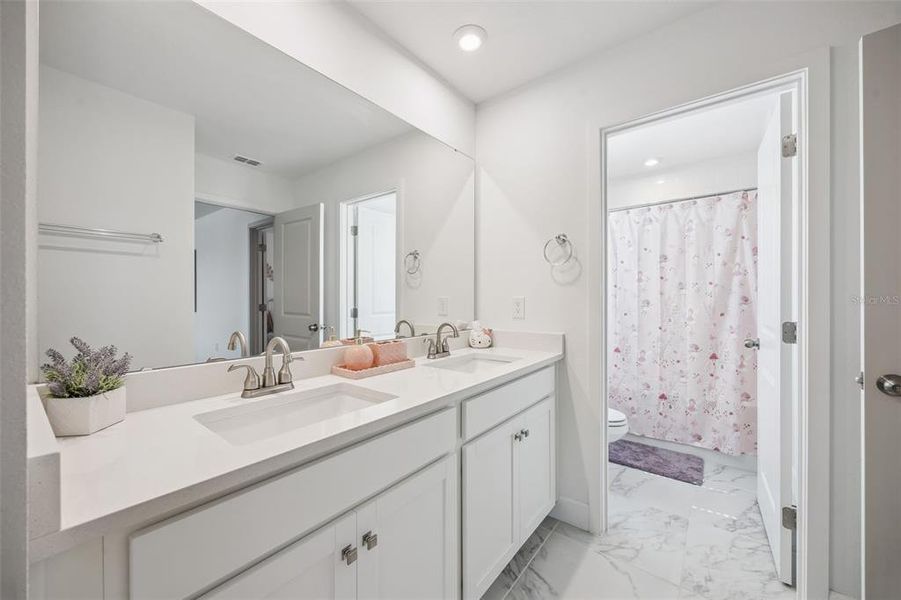 Furnished interior view inside a new home in Waterbrooke, Clermont (Image 32).