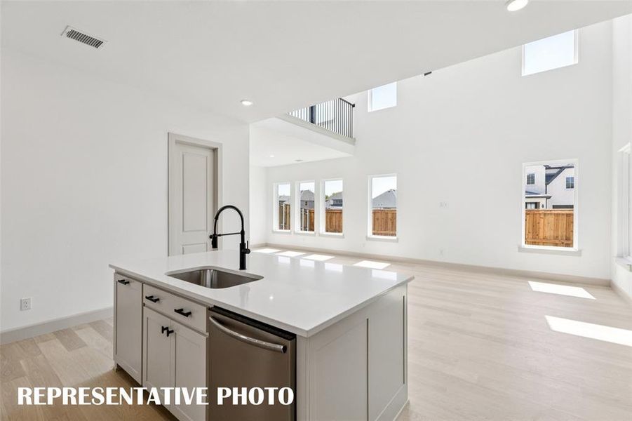 The chef will never be left out of the party in this dream kitchen!  REPRESENTATIVE PHOTO