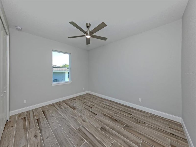 Spacious, unfurnished interior of a new home in , Port Charlotte (Image 26).