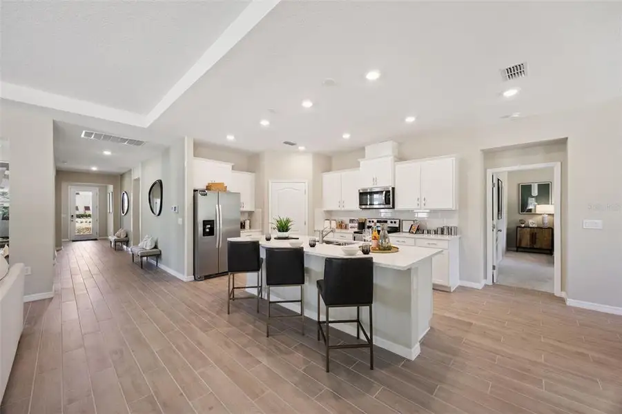 Furnished interior view inside a new home in Archers Mill, Ormond Beach (Image 3).