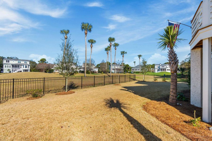 Exterior details and patio area of a home in , Johns Island (Image 32).