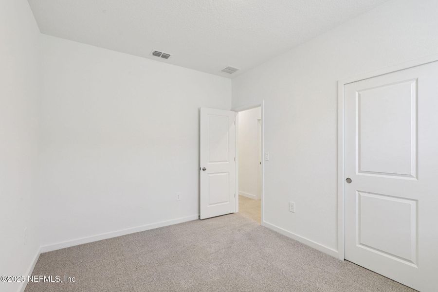 Spacious, unfurnished interior of a new home in Lakes at Bella Lago - Signature Series, Green Cove Springs (Image 20). Spacious, unfurnished interior of a new home in Lakes at Bella Lago - Signature Series, Green Cove Springs (Image 20).