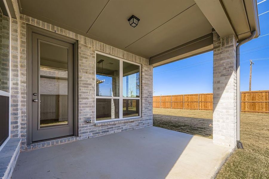 Exterior details and patio area of a home in North Sky 65s, Celina (Image 4).