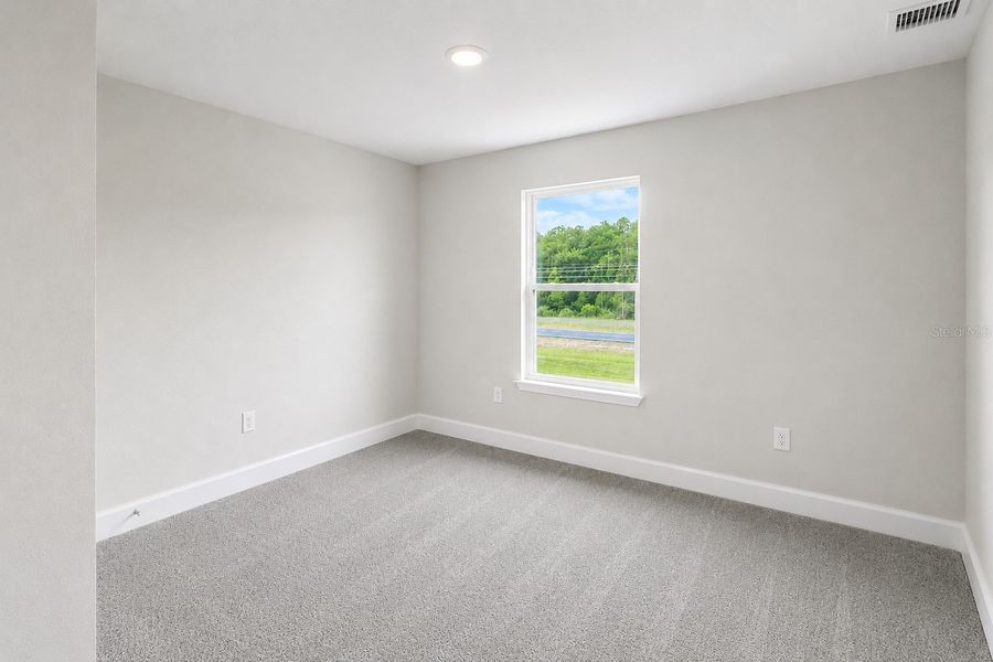 Spacious, unfurnished interior of a new home in Harmony Central, St. Cloud (Image 20).