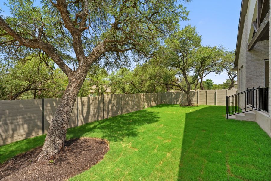 Exterior details and patio area of a home in Wolf Ranch, Georgetown (Image 27).