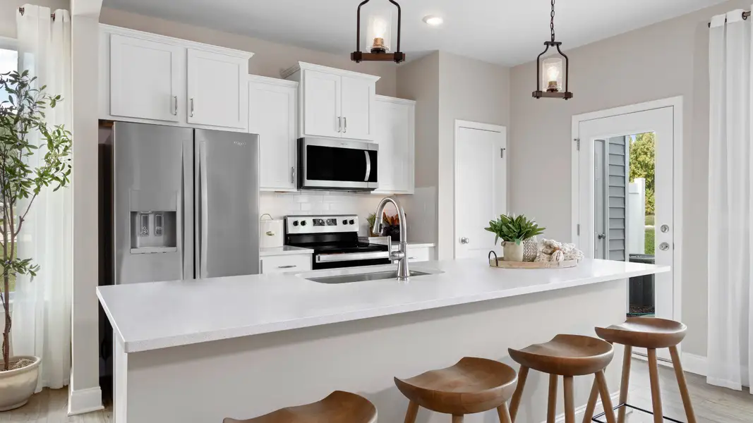 Furnished interior view inside a new home in Kensley Grove, Fuquay Varina (Image 6). Furnished interior view inside a new home in Kensley Grove, Fuquay Varina (Image 6).