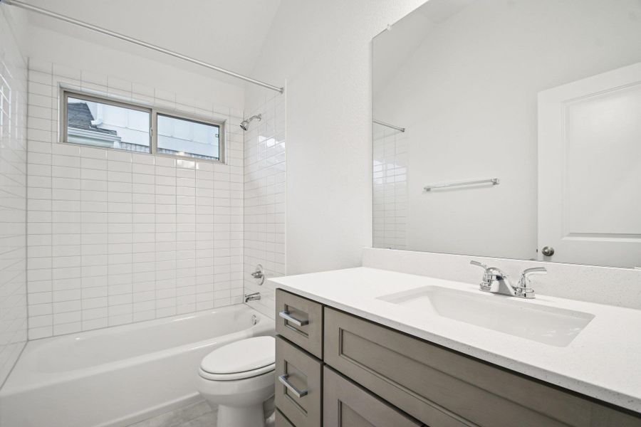 Furnished interior view inside a new home in Crosswinds, Kyle (Image 10).