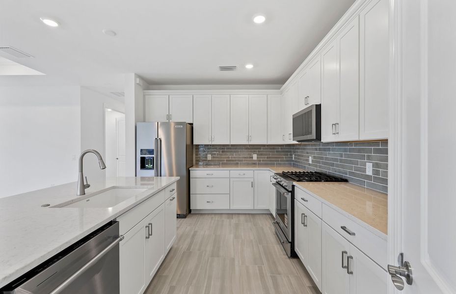 Furnished interior view inside a new home in Arbor Oaks, North Port (Image 3).