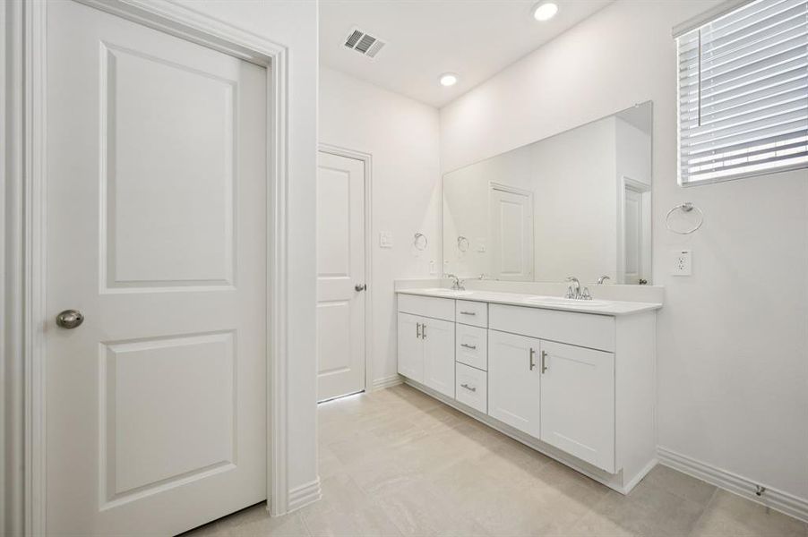 Furnished interior view inside a new home in Lakehaven - Premier Series, Farmersville (Image 14).