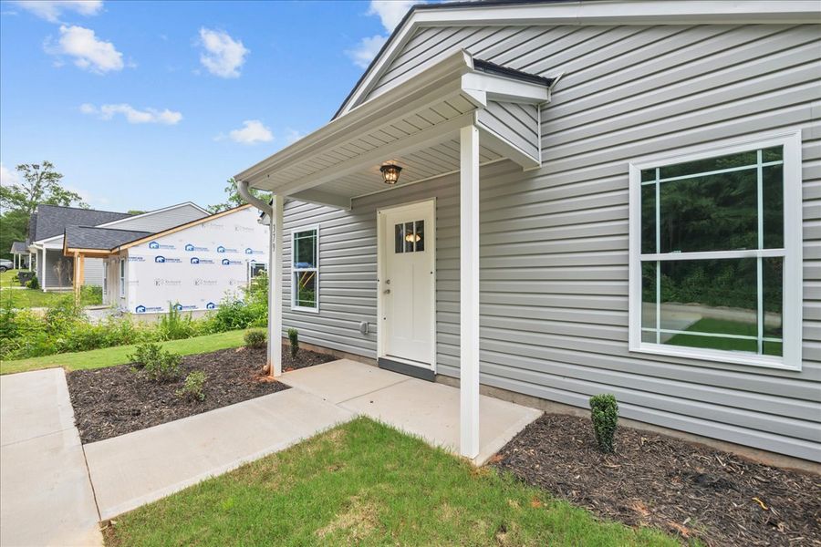 Representative exterior photo of a completed home built from the Elliott by Enchanted Homes in Gentry Place, Spartanburg, SC (Image 16).