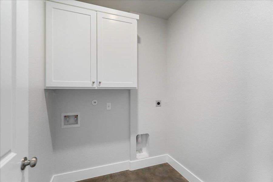 The laundry room includes W/D connections and cabinet space for your laundry needs. The laundry room includes W/D connections and cabinet space for your laundry needs.