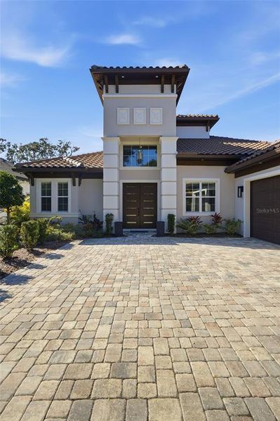 Front exterior of a new home in , Palm Coast, FL, highlighting curb appeal (Image 26).