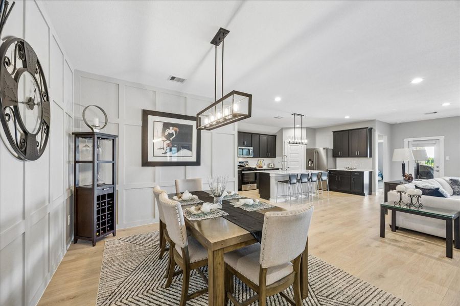 A little closer view of the kitchen.  Absolutely gorgeous selections of flooring, paint, cabinets and more!