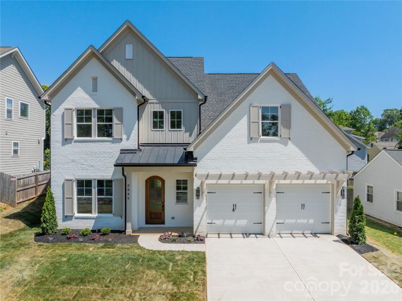 Front exterior of a new home in , Charlotte, NC, highlighting curb appeal (Image 2). Front exterior of a new home in , Charlotte, NC, highlighting curb appeal (Image 2).