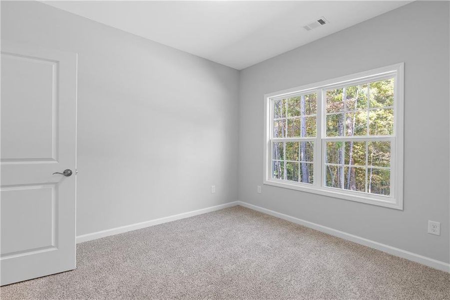 Spacious, unfurnished interior of a new home in , Gray (Image 44).