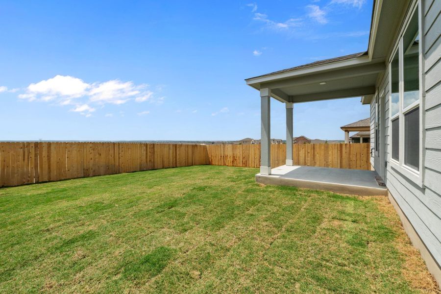 Front exterior of a new home in Salerno - Heritage Collection, Round Rock, TX, highlighting curb appeal (Image 1).