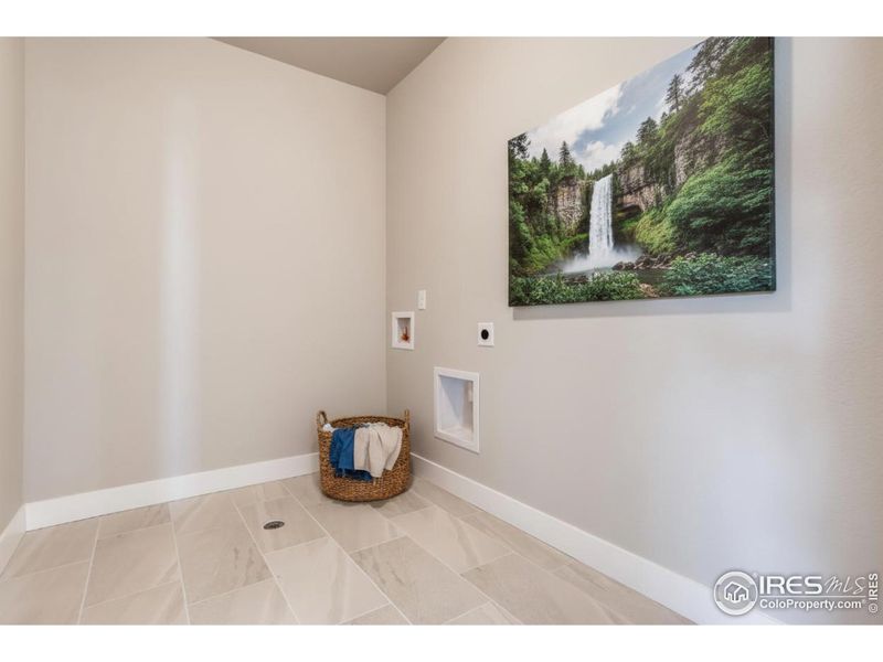 Spacious second floor laundry room with washer and dryer hookups!