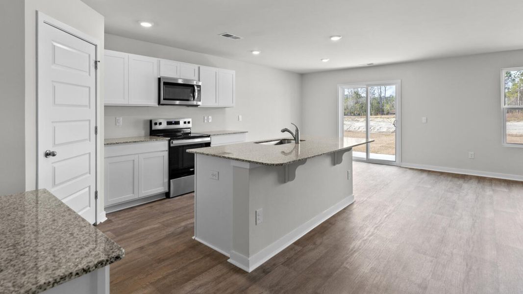 Furnished interior view inside a new home in Cedar Hill Landing, Navassa (Image 6). Furnished interior view inside a new home in Cedar Hill Landing, Navassa (Image 6).