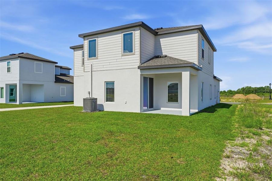 Exterior details and patio area of a home in Gum Lake Preserve, Lake Alfred (Image 29).