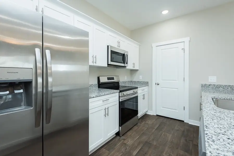 Representative furnished interior of a home built from the TH 1442 INT by Foundation Home Builders LLC in Stokesburg Road Townhomes, Walnut Cove (Image 4).