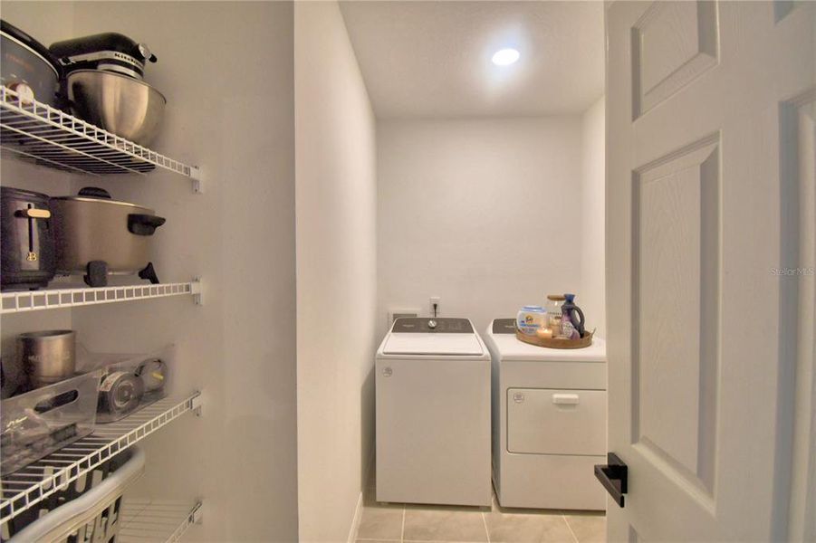 Furnished interior view inside a new home in Lake Deer Estates - Classic Series, Kissimmee (Image 38).