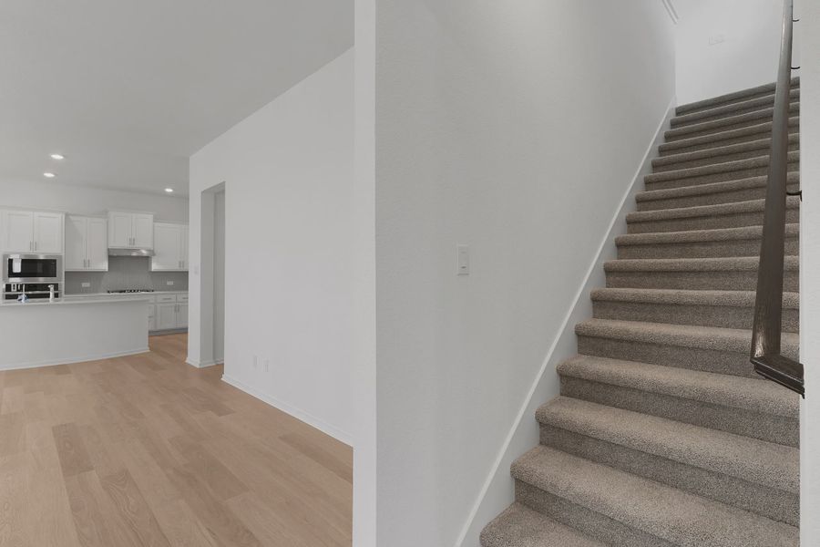 Representative unfurnished interior of a home built from the Annie by Chesmar Homes in Nolina, Georgetown (Image 10).