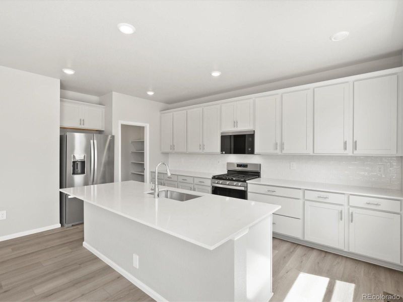 Furnished interior view inside a new home in Poudre Heights: The Alpine Collection, Windsor (Image 13).