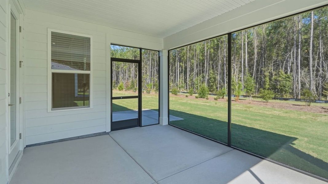Exterior details and patio area of a home in Sun City Hilton Head, Bluffton (Image 23).