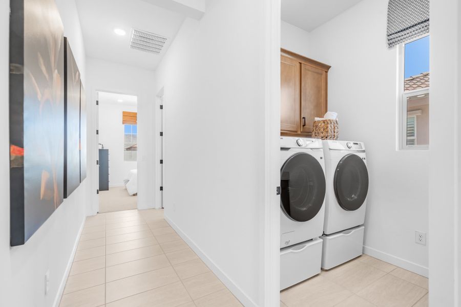 Hallway to Bedroom 2 & Laundry Room | Brisa Model Home | Mira Vista at Victory in Buckeye, AZ by Landsea Homes