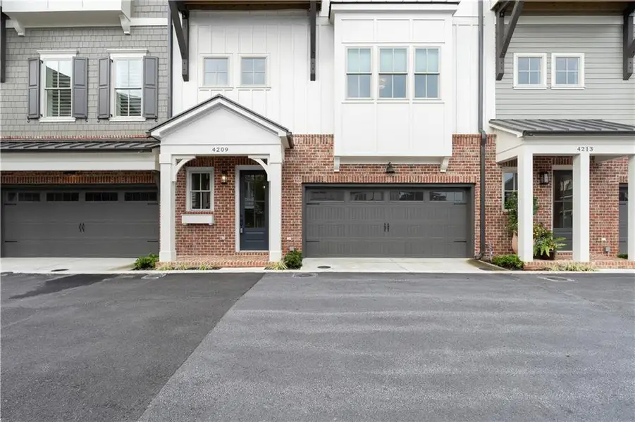 Front exterior of a new home in , Acworth, GA, highlighting curb appeal (Image 1). Front exterior of a new home in , Acworth, GA, highlighting curb appeal (Image 1).