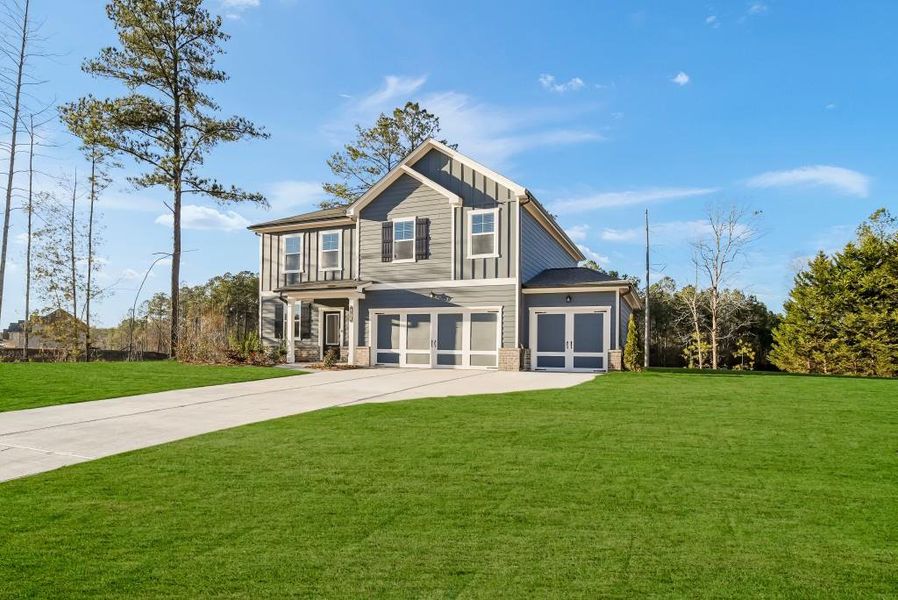 Front exterior of a new home in Shadow Creek, Jackson, GA, highlighting curb appeal (Image 2).