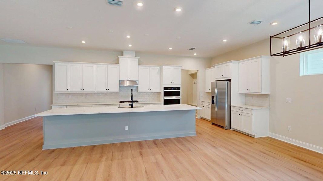 Furnished interior view inside a new home in RiverTown - WaterSong, St. Johns (Image 9).