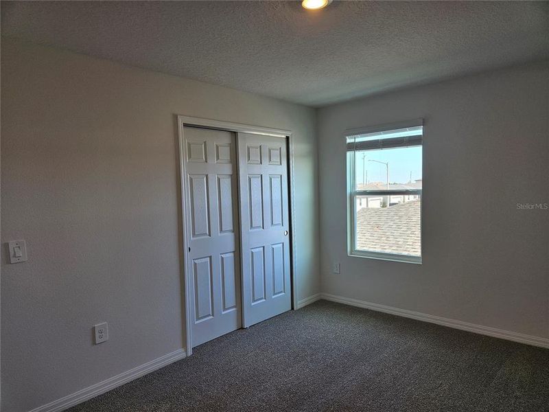 Spacious, unfurnished interior of a new home in Lawson Dunes - Signature Series, Haines City (Image 46).