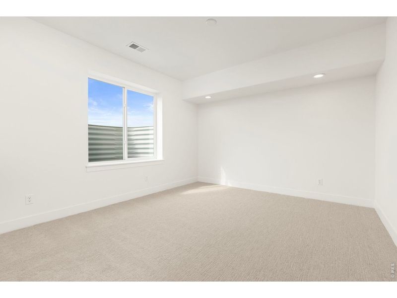 Spacious, unfurnished interior of a new home in RainDance, Windsor (Image 43).