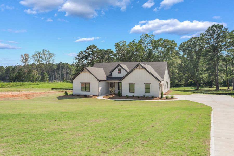 Front exterior of a new home in The Reserve at Reidsboro, Williamson, GA, highlighting curb appeal (Image 28).