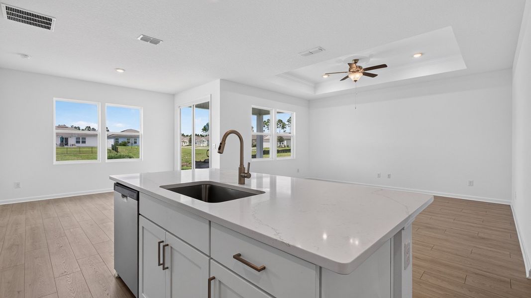 Representative furnished interior of a home built from the Alden by D.R. Horton in Broward Key, Jacksonville (Image 7).
