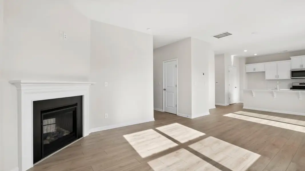 Spacious, unfurnished interior of a new home in Durbin Meadows Traditions, Fountain Inn (Image 21).
