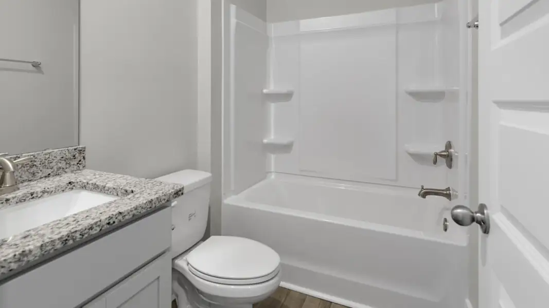 Furnished interior view inside a new home in The Retreat at Indigo Preserve Townhomes, Leland (Image 10).